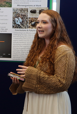 A female student presenting her project