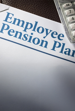 Document titled 'Employee Pension Plan' with a calculator on a desk.