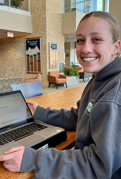 Jordan Serrahn, a MBA student, uses free Kaplan test prep software to study for the LSAT.