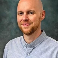 headshot of Brandon Damm