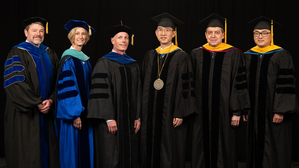 Yanhui Guo poses with UIS leaders during his Ceremony of Investiture.