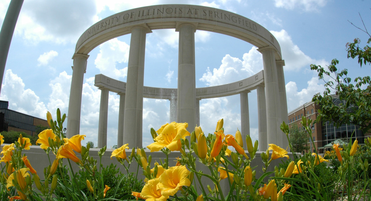 the colonnade in the background with flowers in the foreground