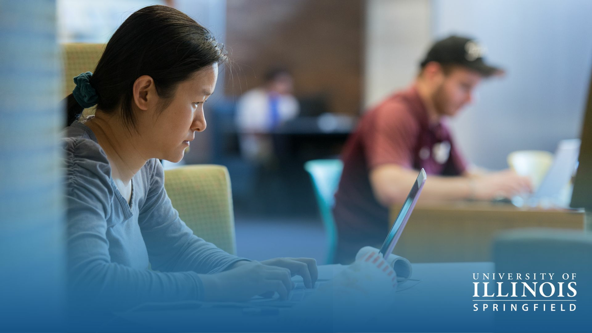 Student at computer.