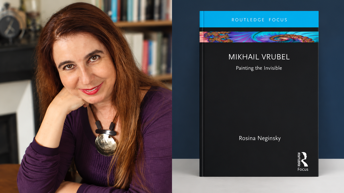 Smiling woman beside a book titled "Phenomenology."