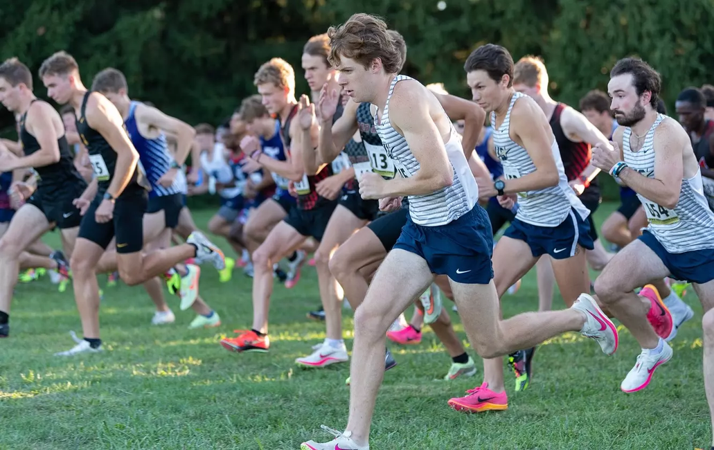 Men's Cross Country runners take off from the starting line