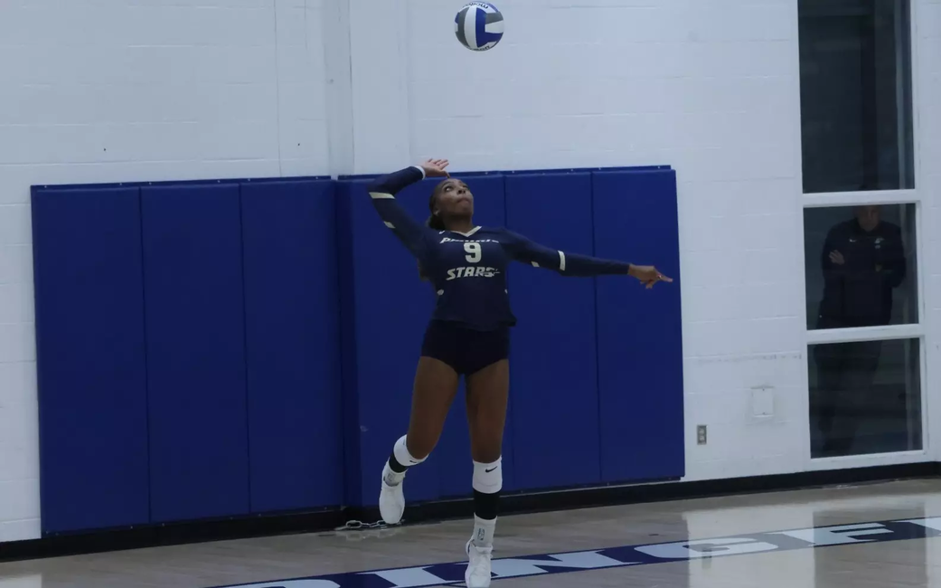 Erica Sledge serving