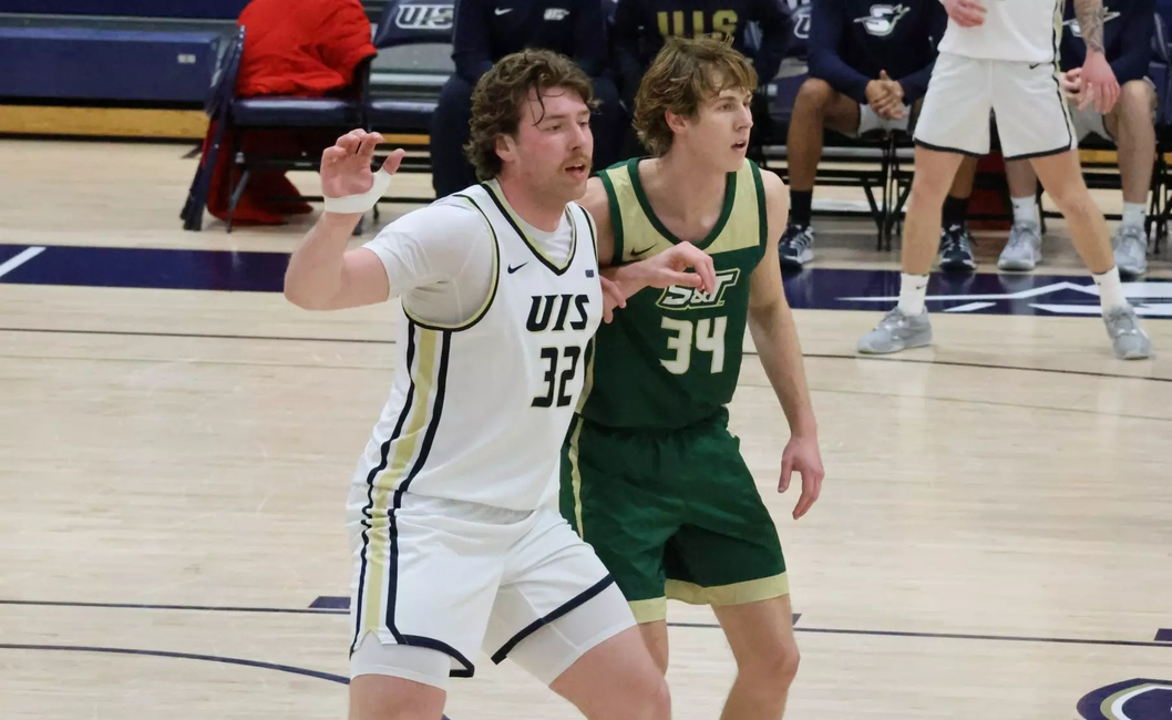 Isaiah Esker playing basketball