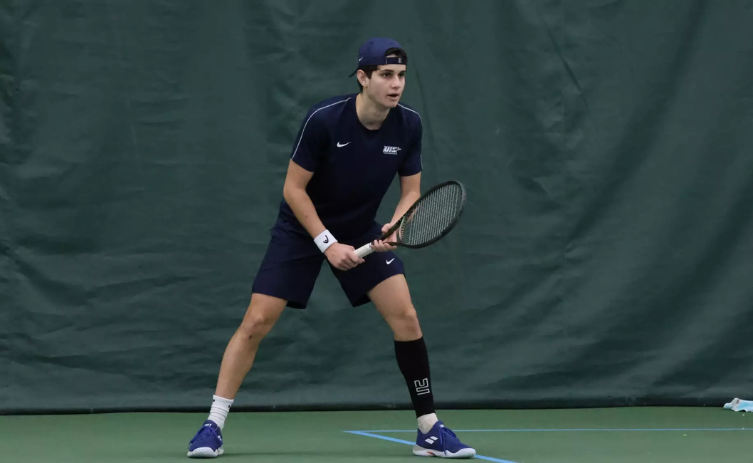 Jorge Roman playing tennis