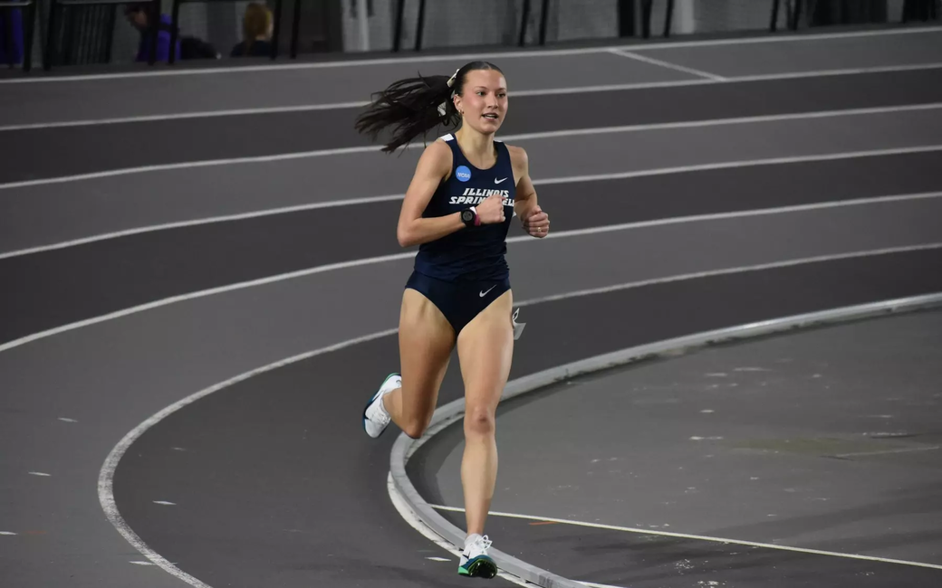Maddie Miller-Ross running on an indoor track