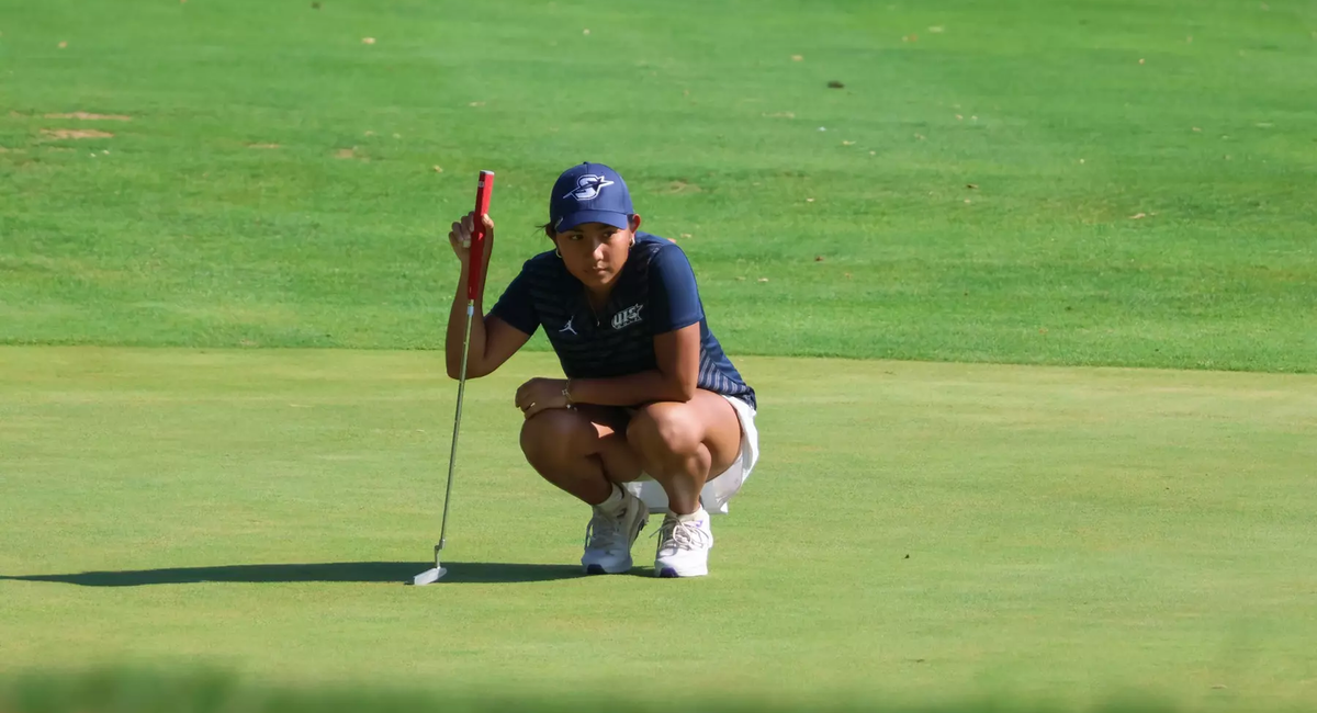 Fizreen Ahmadfadzir prepares to putt