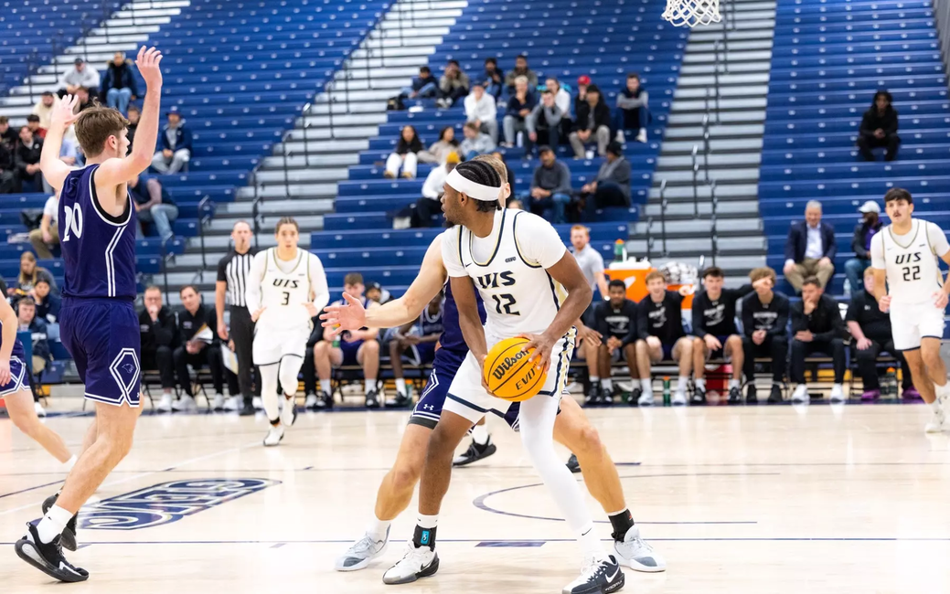 Marlon Williams playing basketball at UIS