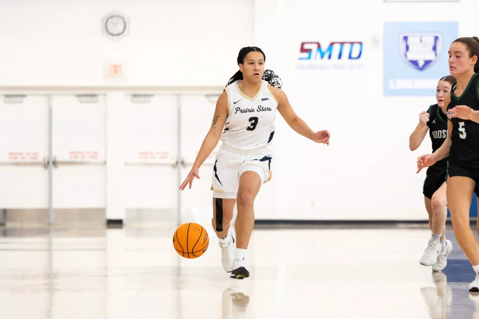 Kayla Rice playing basketball at UIS