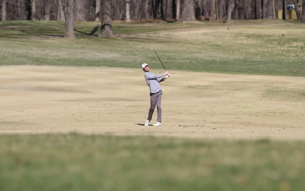 Brady Wilson golfing in fairway