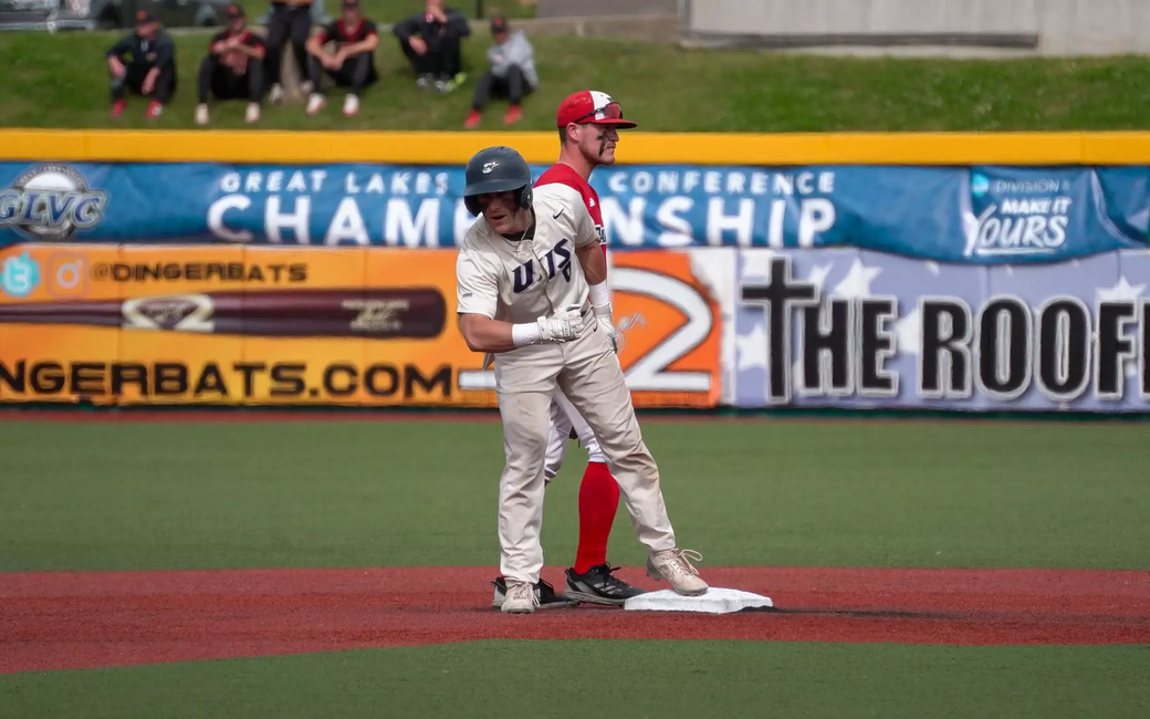 Ethan Bowers celebrates on second base