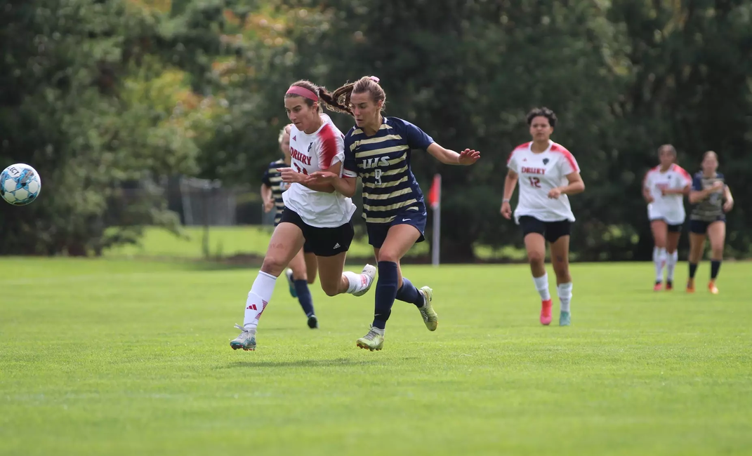 Megan Little playing soccer