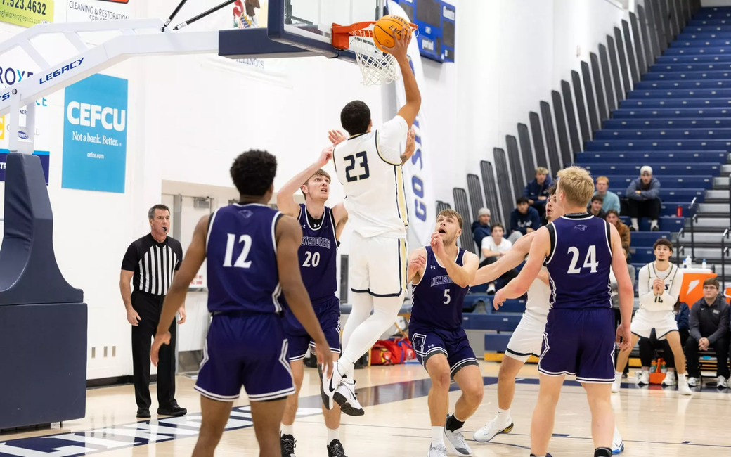 Tye Banks playing basketball at UIS