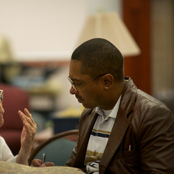 student talking to older nun