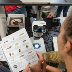 students with microscope