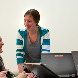 students and professor talking