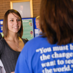 student talking with professor