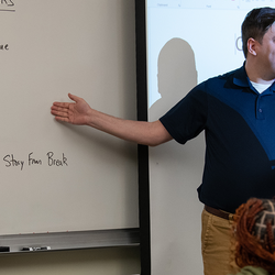 professor teaching communication class