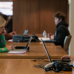students at the Student Union working on their laptops