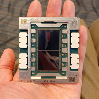 An IBM Telum II chip, with its metallic and green components