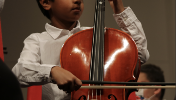 Kid playing cello
