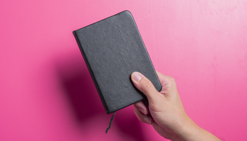 Person holding up journal