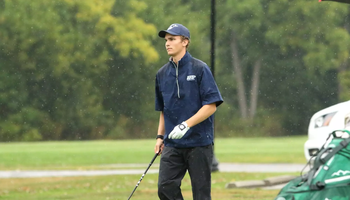 Vilgot Arlebach golfing in rain