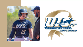 A photo of Danielle Dennis on base in a softball game