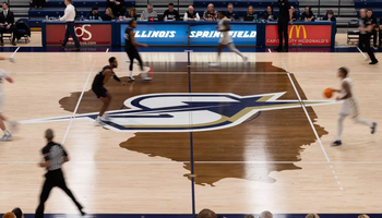 UIS men's basketball long exposure court shot