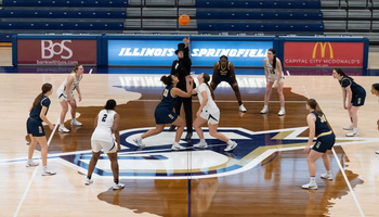 Abe Lincoln holds ball for UIS WBB tip-off photo