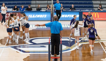 UIS Volleyball and opponent on UIS court