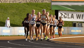 Madelyn Miller-Ross leading a pack of runners in a track race