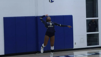 Erica Sledge serving