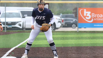 Ella Brinkley playing third base