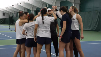 UIS women's tennis team huddle