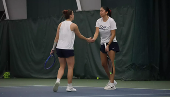 Cristina Mendoza Romero and Jane Carter playing tennis