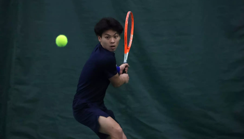 Lin En Tan playing tennis at UIS