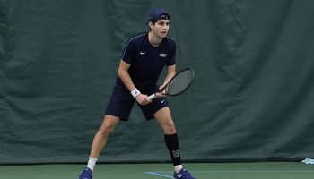 Jorge Roman playing tennis