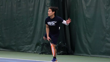 Li En Tan Playing Tennis