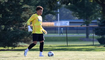 Kevin Kardel goalkeeping in yellow UIS jersey at Kiwanis Stadium