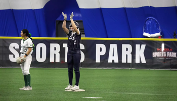 Calista Stahlhut celebrates on second base