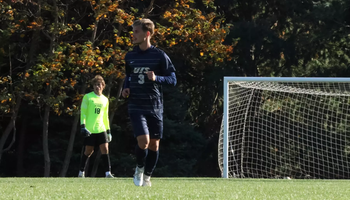 Adam Knaze playing soccer