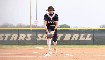 Rosie Bartletti in the circle in blue UIS uniform