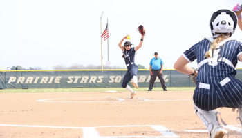 Rosie Bartletti pitching in blue UIS uniform at UIS Softball Field