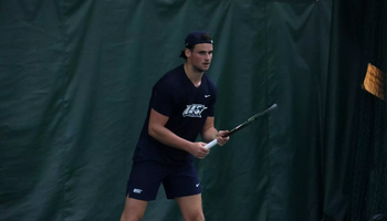 Antonio Ayerbe Streubel playing tennis in UIS uniform
