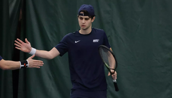 Jorge Roman during doubles match