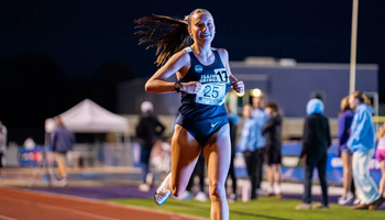 Madelyn Miller-Ross crosses finish line at track meet